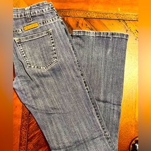 Cowgirl Tuff Jeans measure 28x35